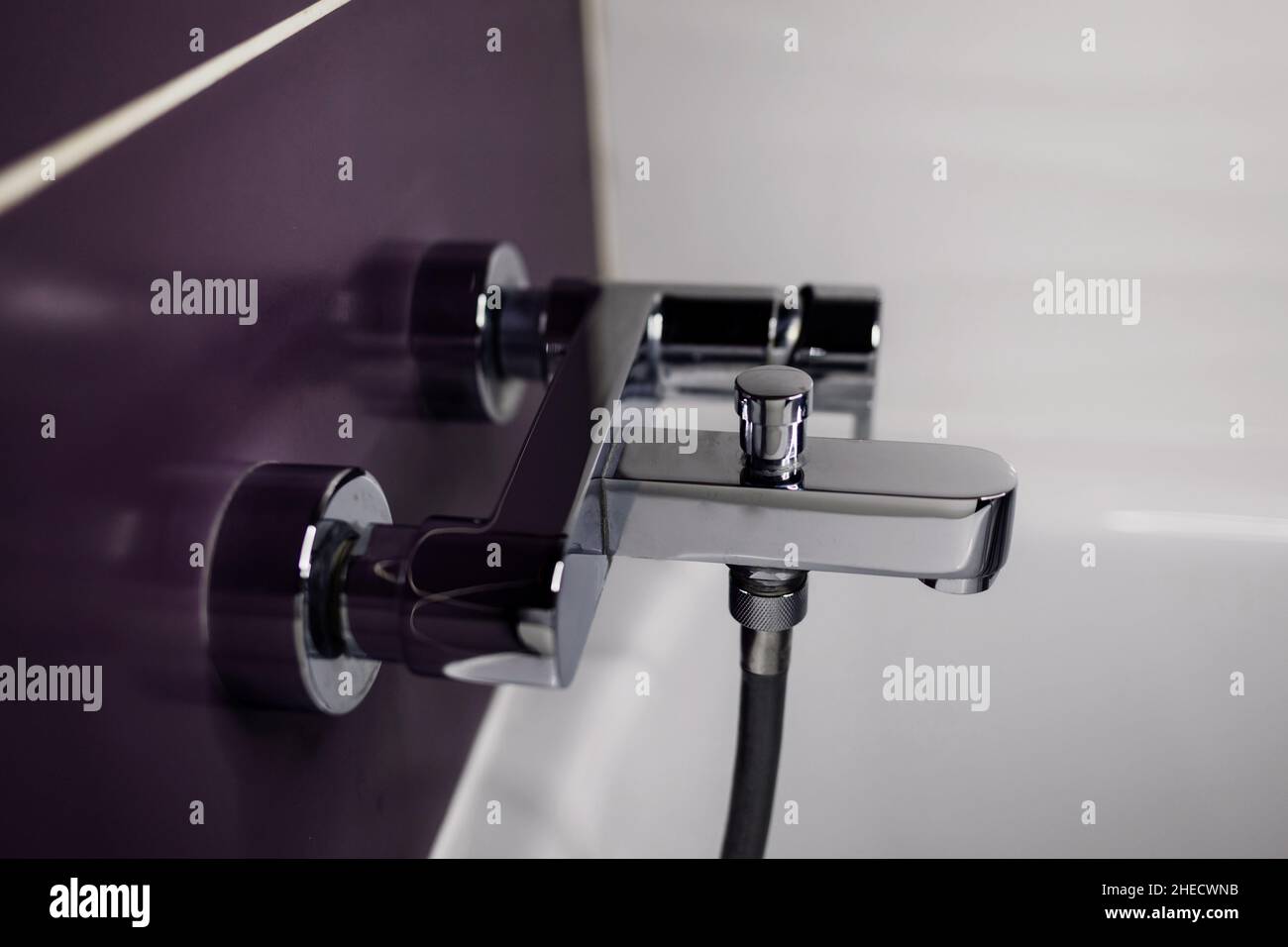 modern shiny faucet in the bathroom. steel plumbing Stock Photo Alamy