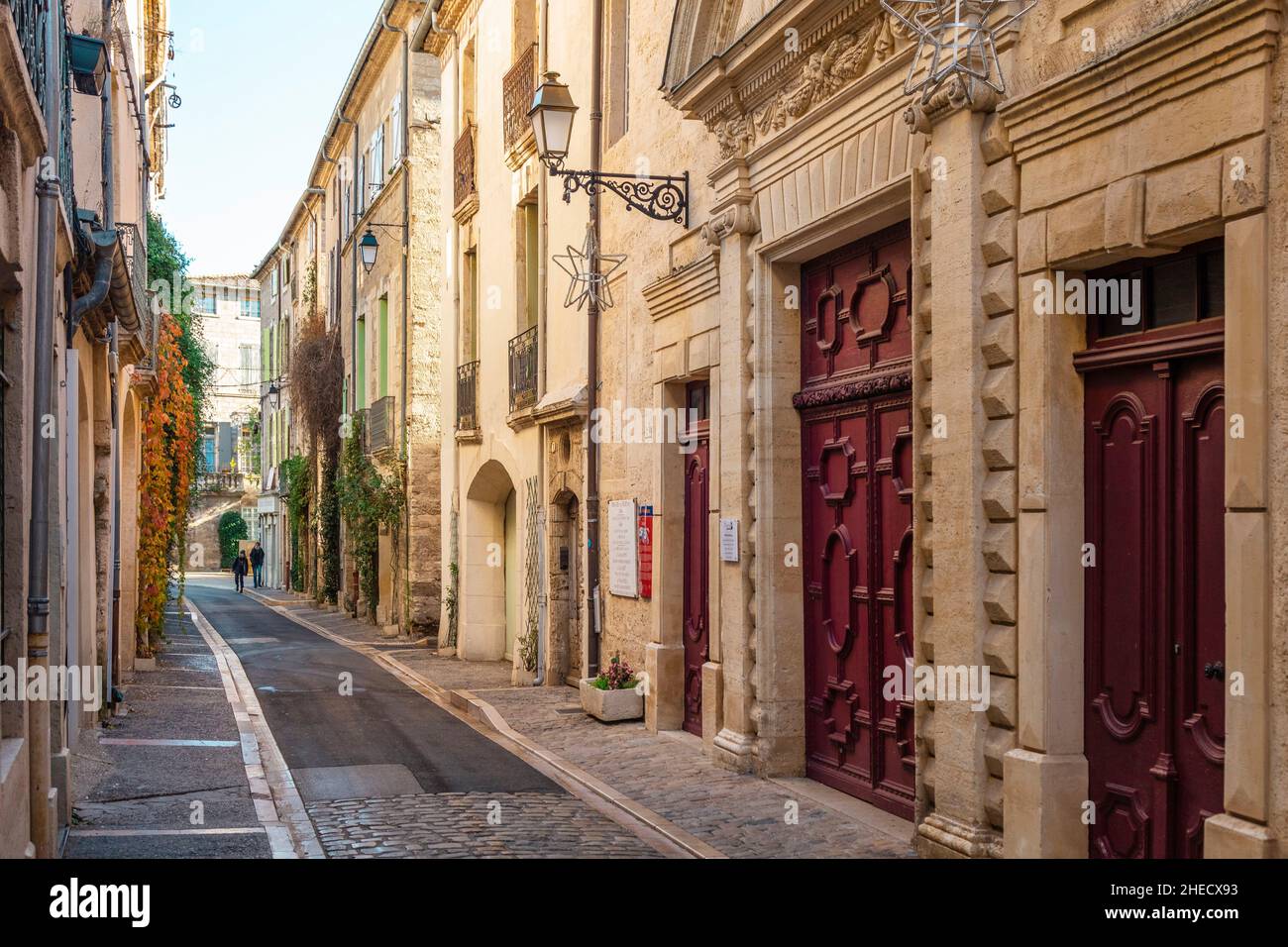 France, Herault, Pezenas, Pezenas theater, downtown street of a southern village and the facade of a theater Stock Photo