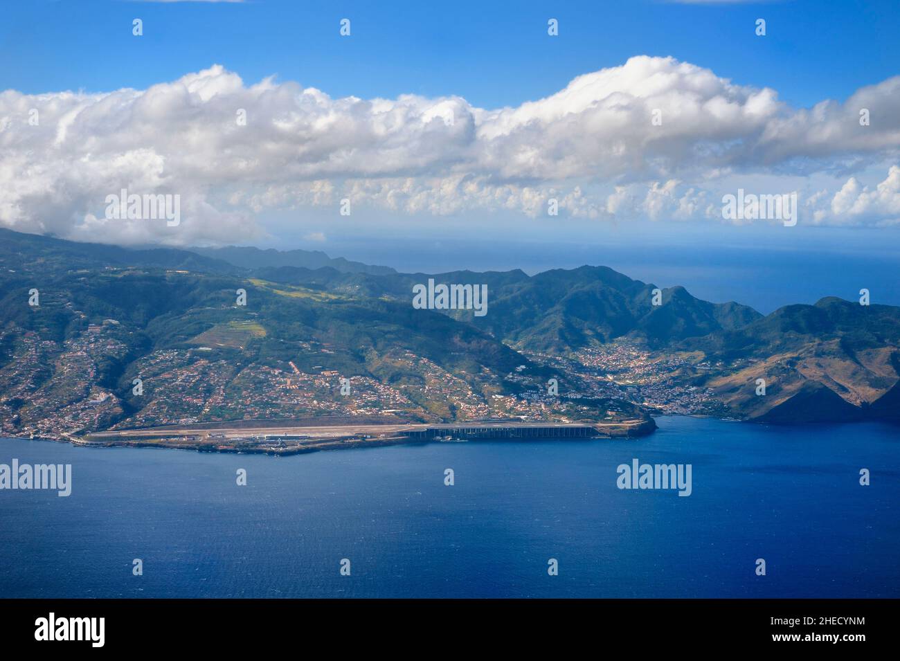 Portugal, Madeira Island, Madeira Cristiano-Ronaldo International Airport which has a 2781m runway extended over the sea thanks to pillars (aerial view) Stock Photo