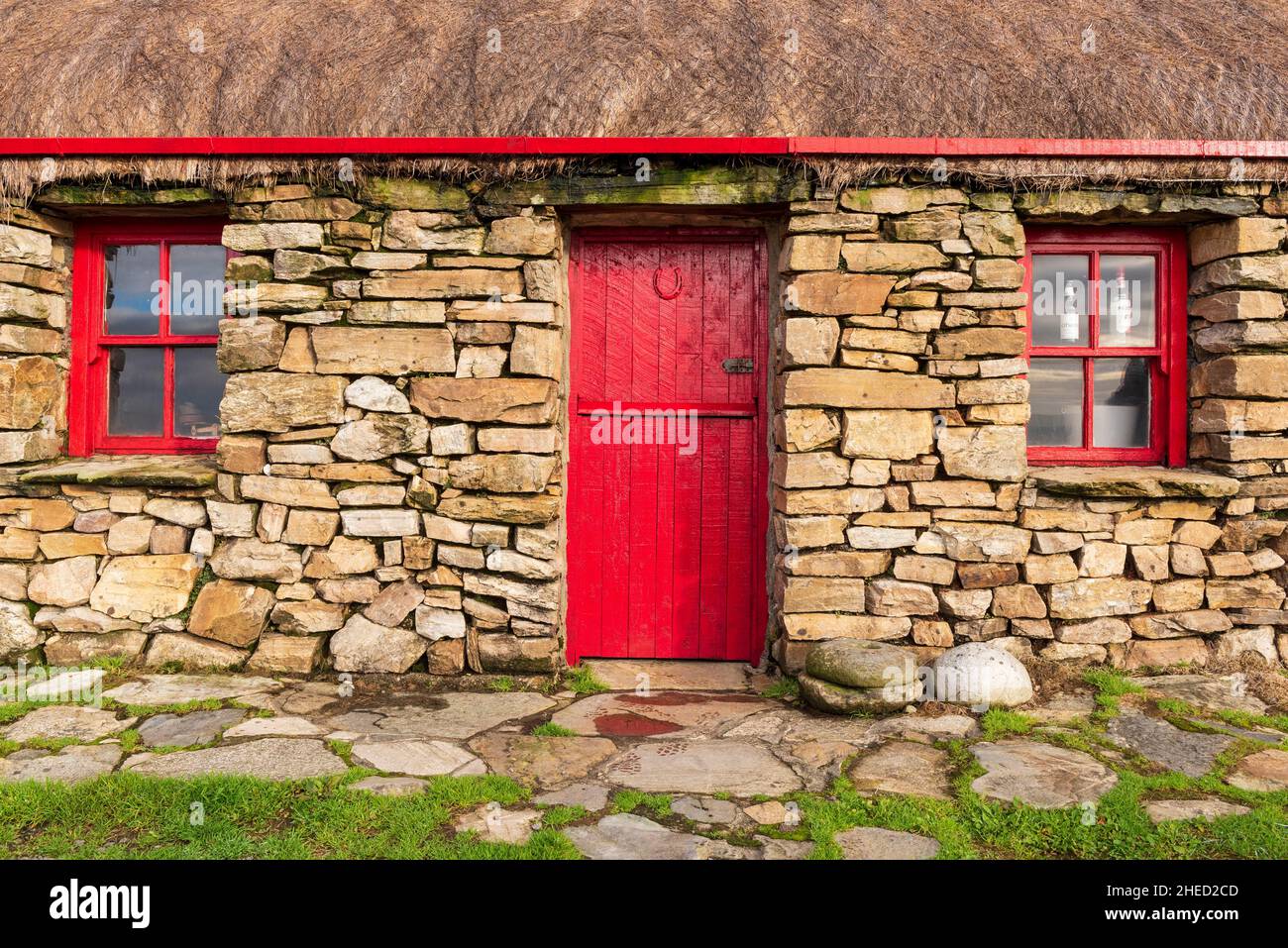 Ireland, County Galway, Clifden, Lettershea, Connemara, traditional stone and thatched farmhouse at Connemara Heritage & History Centre Stock Photo