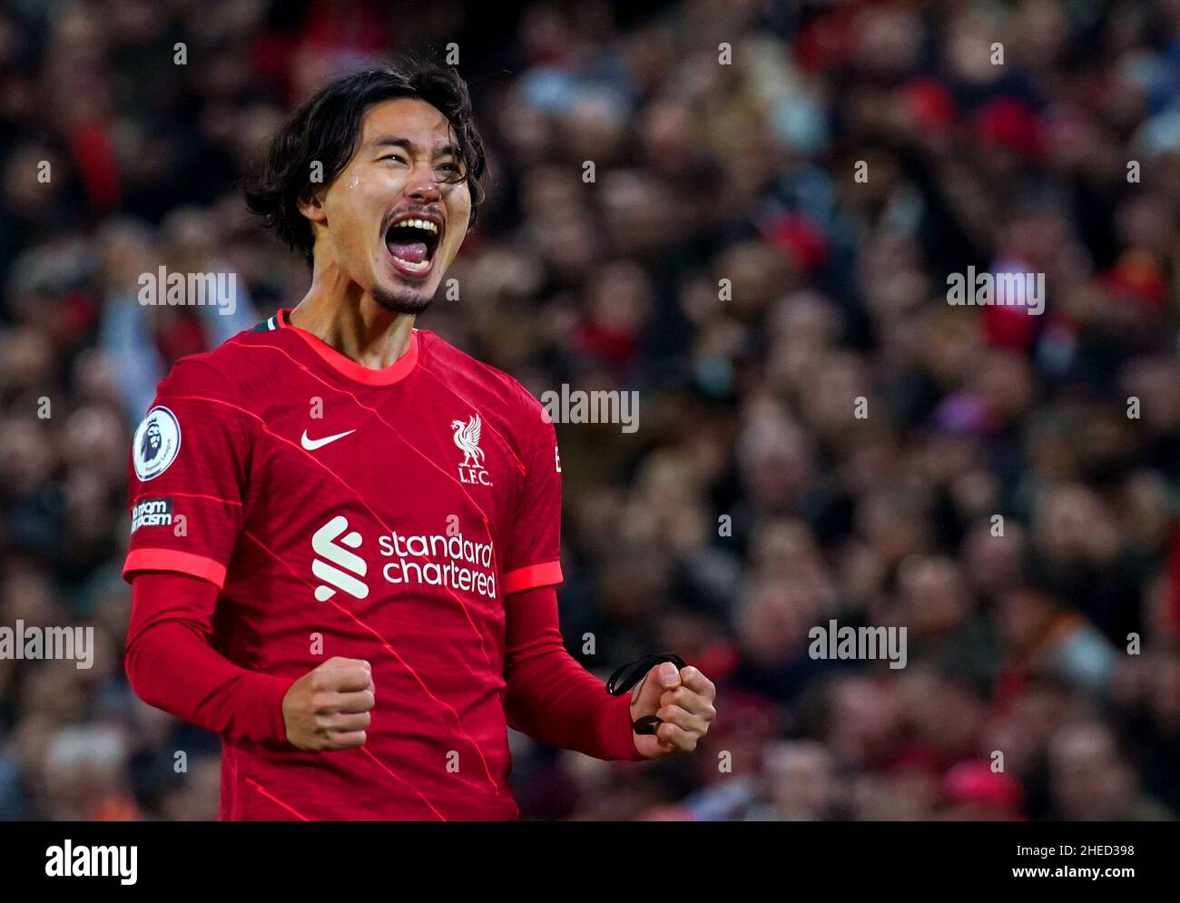 File photo dated 20-11-2021 of Liverpool's Takumi Minamino celebrates scoring their side's fourth goal of the game during the Premier League match at Anfield, Liverpool. Liverpool manager Jurgen Klopp admits they 'desperately' need forward Takumi Minamino to stay fit to cover for the absences of Mohamed Salah and Sadio Mane. Issue date: Monday January 10, 2022. Stock Photo