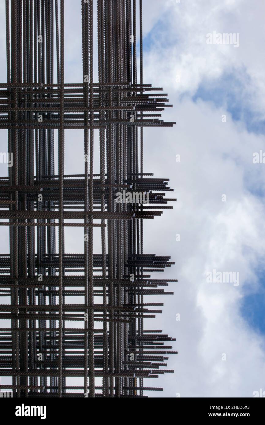 Reinforcing bars framework for armored concrete construction. Blue cloudy sky Stock Photo