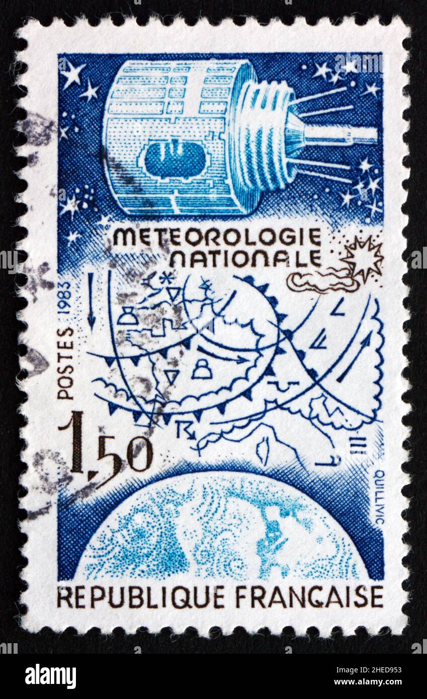 FRANCE - CIRCA 1983: a stamp printed in the France shows National Weather Forecasting, Satellite, Map and Globe, circa 1983 Stock Photo