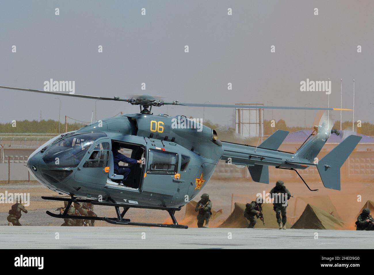 KAZAKHSTAN AIR FORCE EC145 HELICOPTER SUPPORTING GROUND TROOPS. Stock Photo