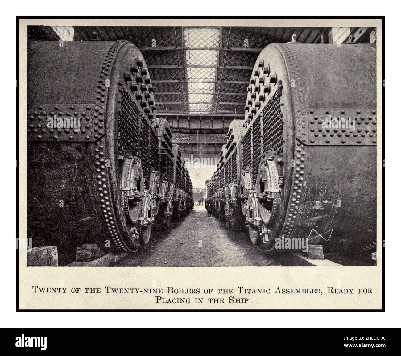 Titanic boilers assembled and ready for installation into RMS Titanic vintage archive image 1900s Harland and Wolff shipyard RMS Titanic was the largest ship afloat at the time she entered service and the second of three Olympic-class ocean liners operated by the White Star Line. She was built by the Harland and Wolff shipyard in Belfast. Stock Photo
