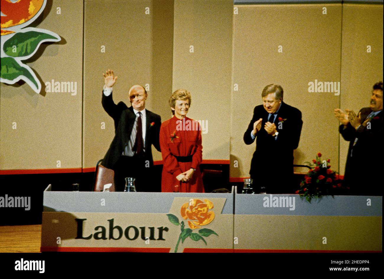 Labour party leader Neil Kinnock with his wife Glenys and Roy Hattersley. Colin Welland on the right at the Labour Party Conference Stock Photo