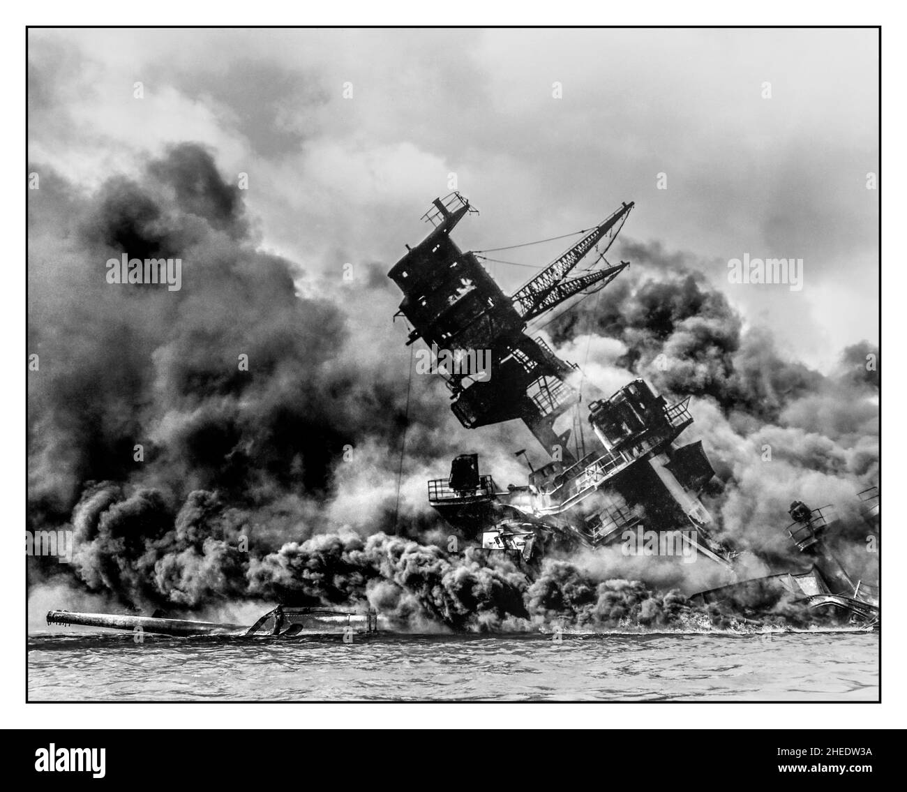 PEARL HARBOR ATTACK Japanese aerial bombing attack on Pearl Harbor 7th December 1941 USS Arizona Battleship BB-39 battleship on fire and sinking Stock Photo