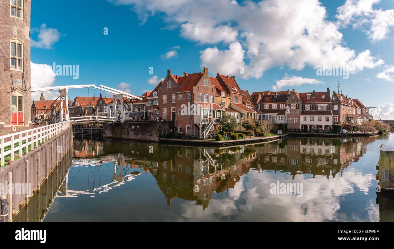 Enkhuizen a city in the Netherlands. Left building is the Drommedaris it is the southern gateway Stock Photo