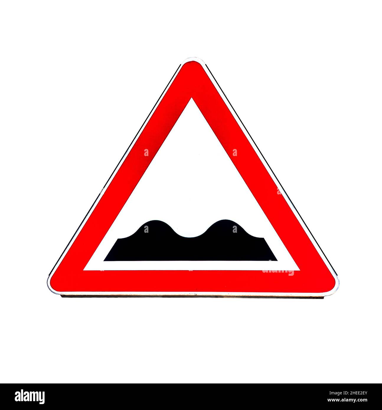 Road sign indicating speed bumps or uneven road isolated on white Stock Photo