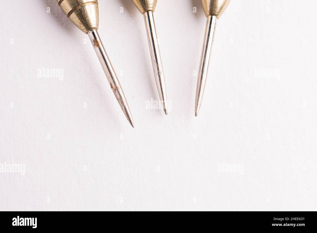 Three arrows dart tips on white with text space Stock Photo