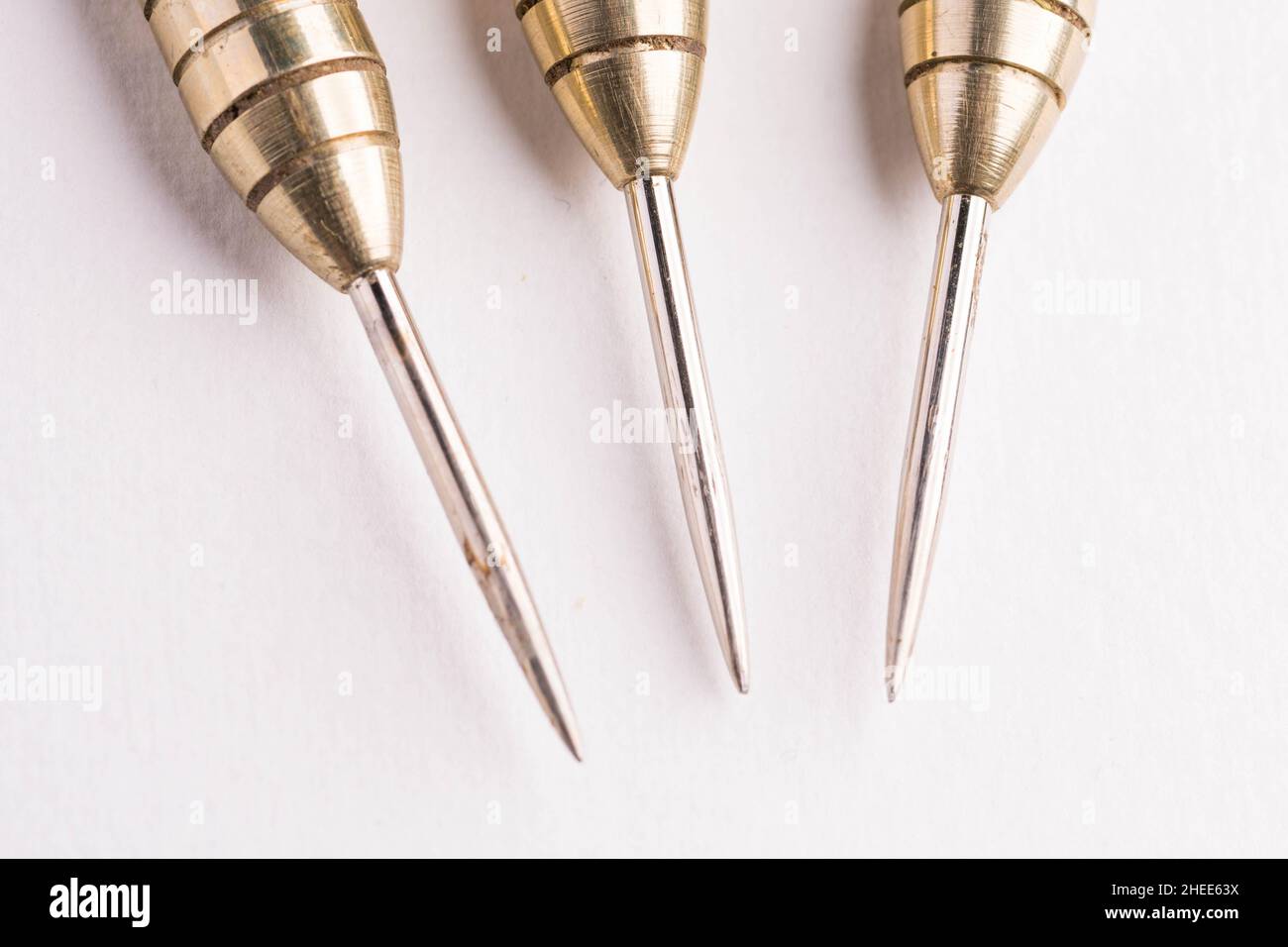 Three arrows dart tips on white with text space Stock Photo