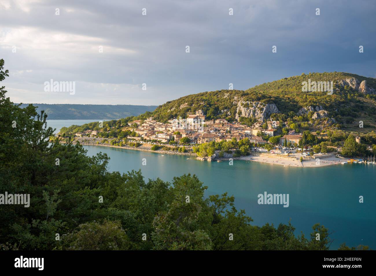 This landscape photo was taken in Europe, in France, Provence Alpes Cote dAzur, in the Var, in summer. We see the town of Bauduen on the shores of Lak Stock Photo
