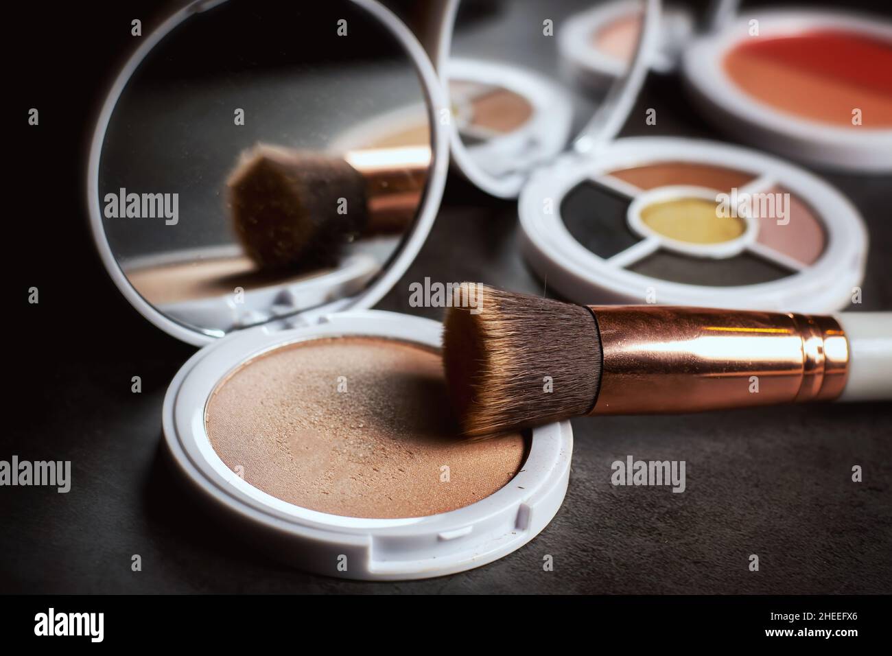 Foundation with a make up brush. Stock Photo