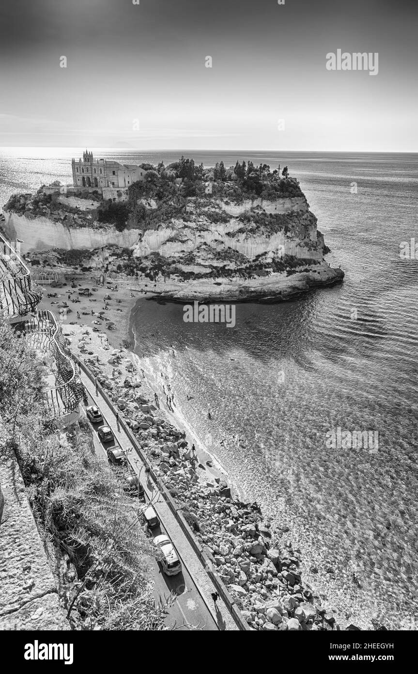 View over Isola Bella Beach, iconic seaside place in Tropea, a seaside resort located on the Gulf of Saint Euphemia, part of the Tyrrhenian Sea, Calab Stock Photo