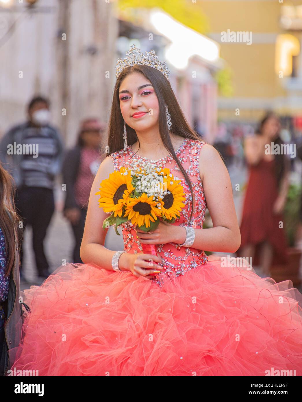 Guatemalan posing in the street of Antigua during the Flower Festival, Antigua, Guatemala Stock Photo