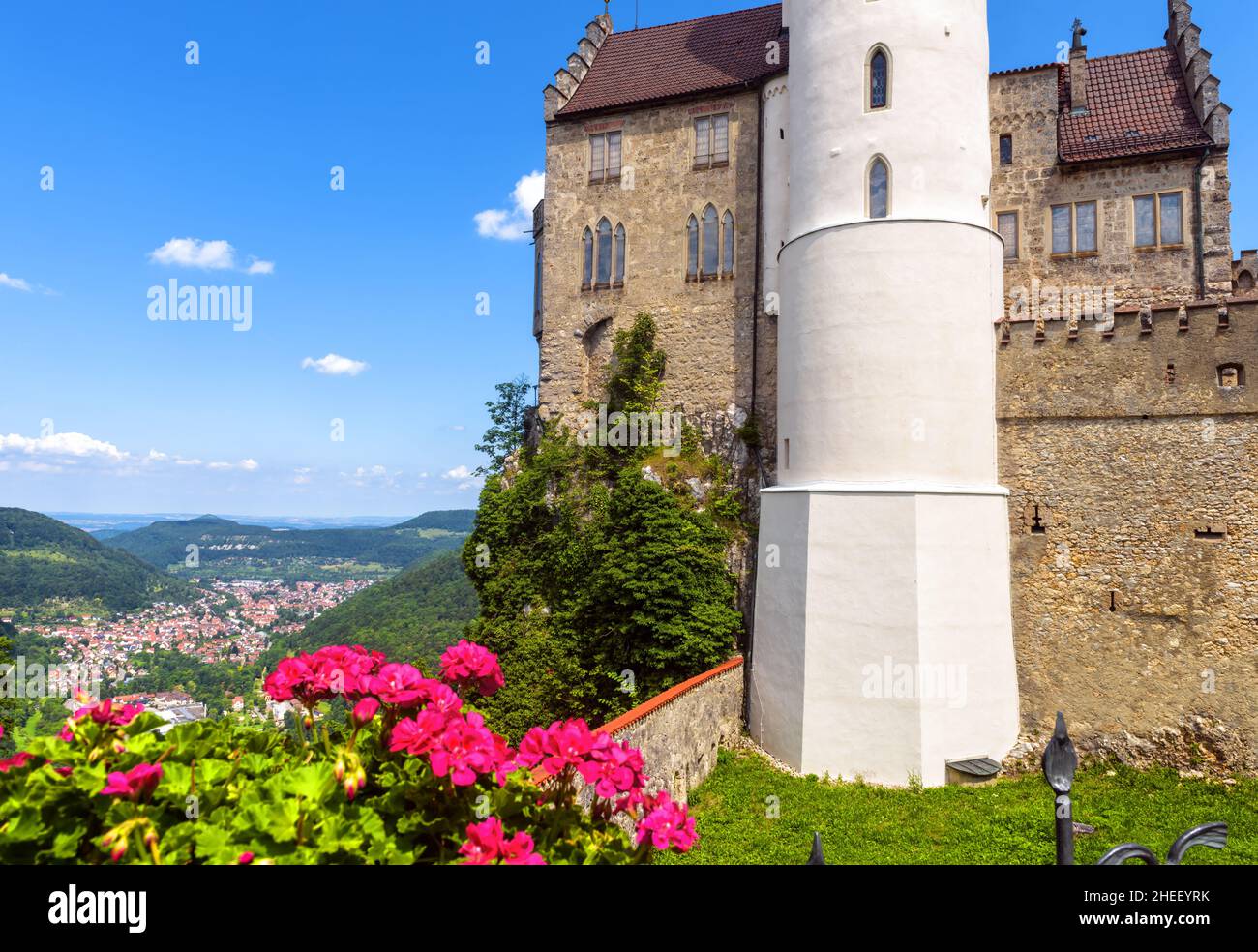 Lichtenstein Castle overlooking city, Germany, Europe. This castle on mountain top is landmark of Schwarzwald, Baden-Wurttemberg. Scenic view of old h Stock Photo