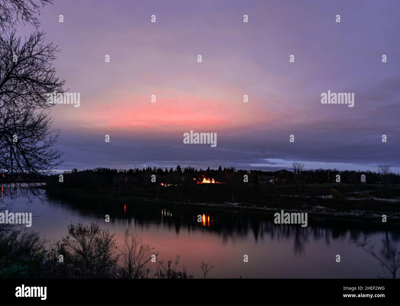 beautiful view of the red river with calm water and light reflections Stock Photo