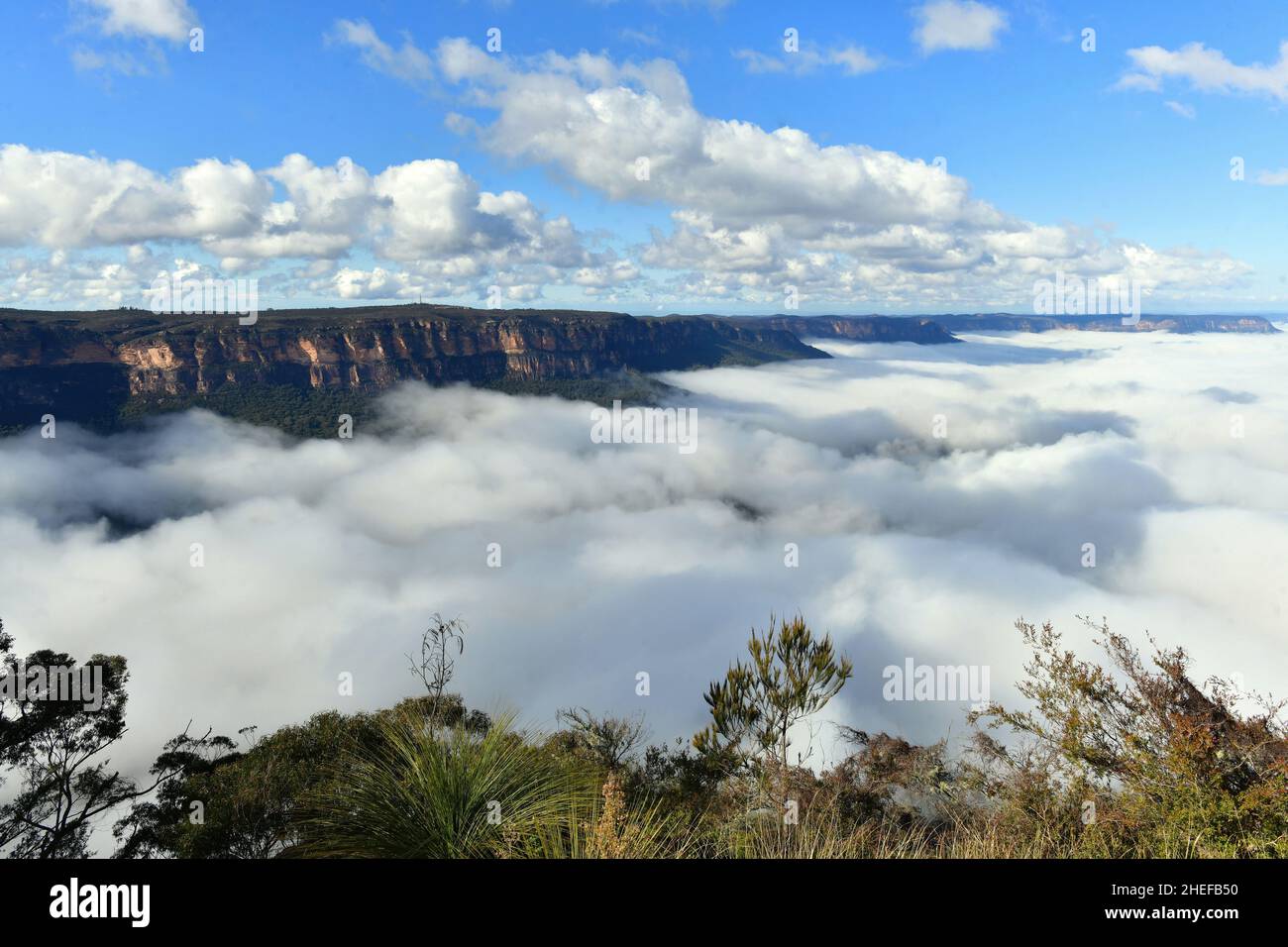 Mist in the valley as seen from Sublime Point Lookout at Leura in the Blue Mountains of Australia Stock Photo