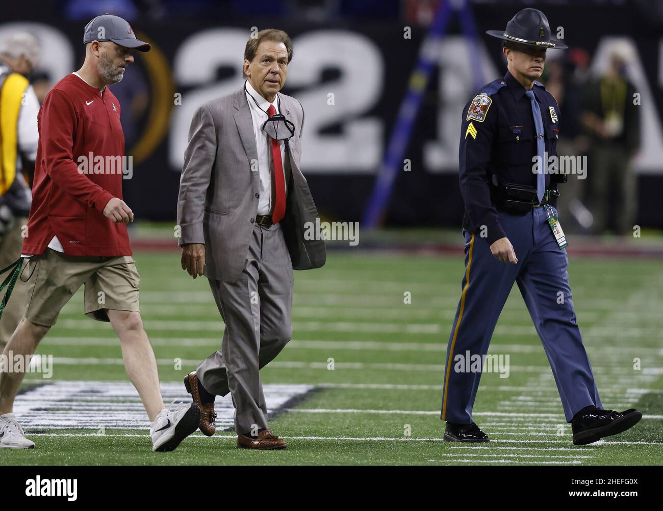 Indianapolis, United States. 10th Jan, 2022. Alabama Crimson Tide head coach Nick Saban (C) enters the field during warmups for the 2022 NCAA National Championship football game against Georgia at Lucas Oil Stadium in Indianapolis, Indiana, on Monday, January 10, 2022. Photo by Aaron Josefczyk/UPI Credit: UPI/Alamy Live News Stock Photo