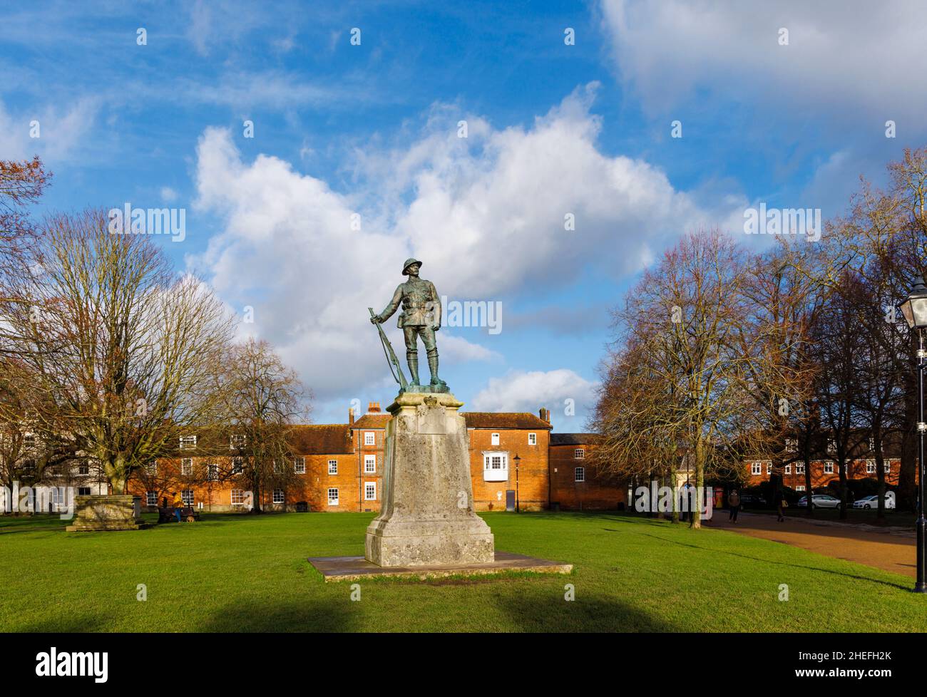 Commemorative memorial bronze statue of a rifleman of The King's Royal Rifle Corps in Cathedral Close, Winchester, Hampshire, England Stock Photo