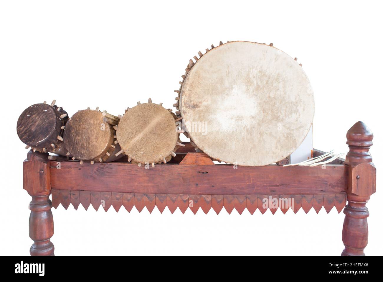 Big ancient drum is in temple.Cow leather drum.White background Stock Photo