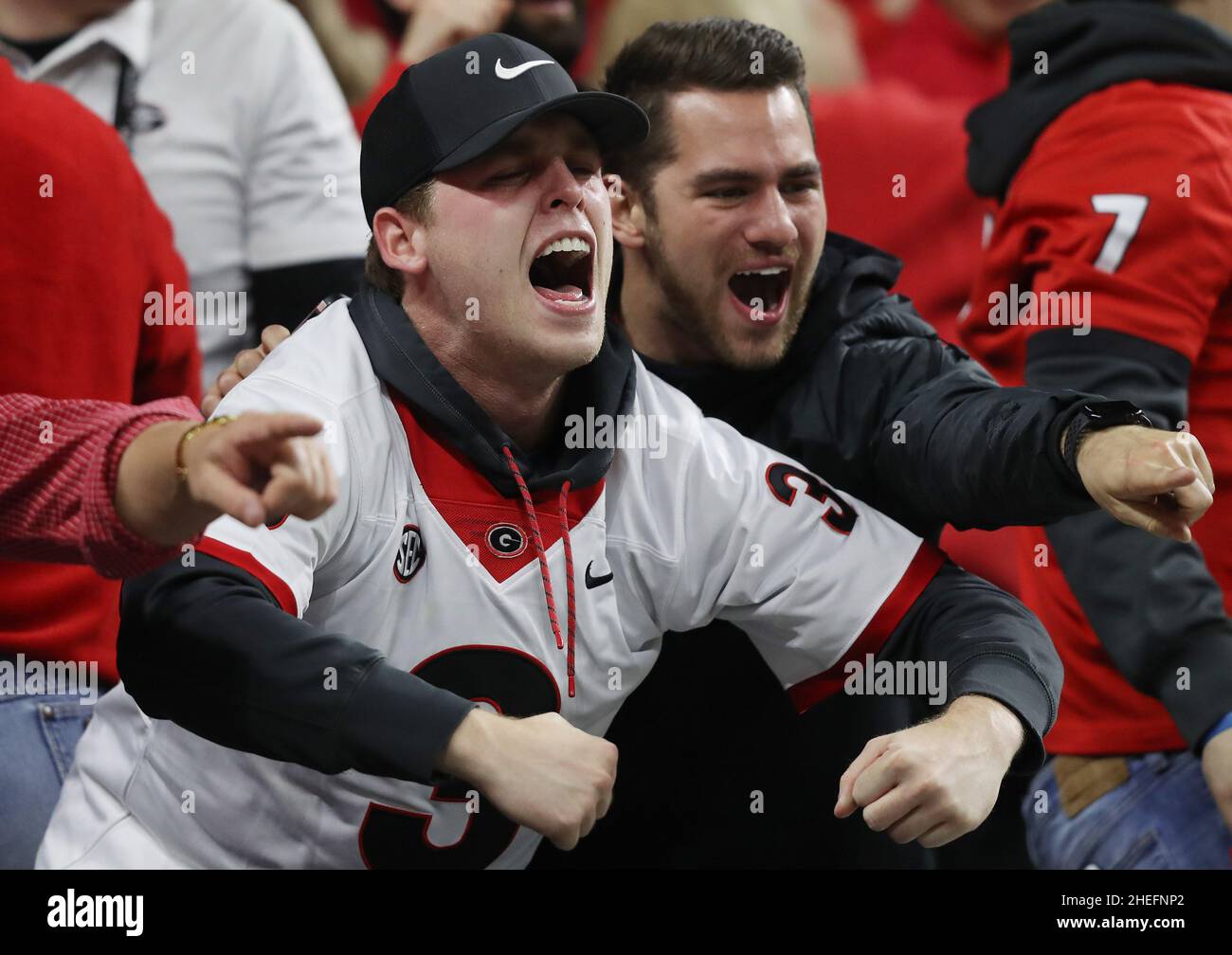 Indianapolis, United States. 10th Jan, 2022. Georgia Bulldogs fans react during the first half of the 2022 NCAA National Championship football game against the Alabama Crimson Tide at Lucas Oil Stadium in Indianapolis, Indiana, on Monday, January 10, 2022. Photo by Aaron Josefczyk/UPI Credit: UPI/Alamy Live News Stock Photo