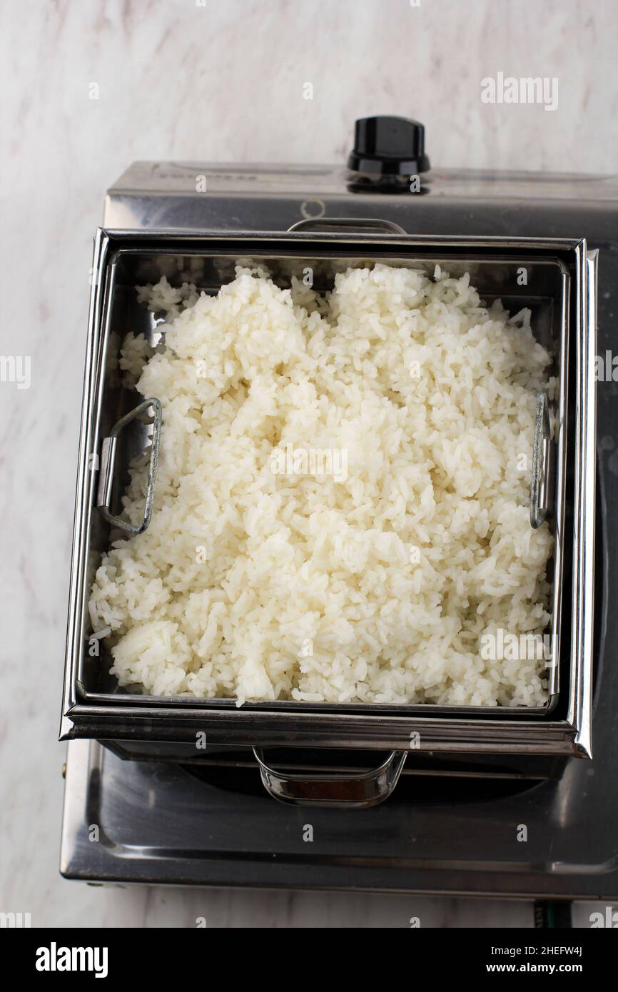 Top View Steam White Rice with Alumunium Steamer, Typical Asian Way to