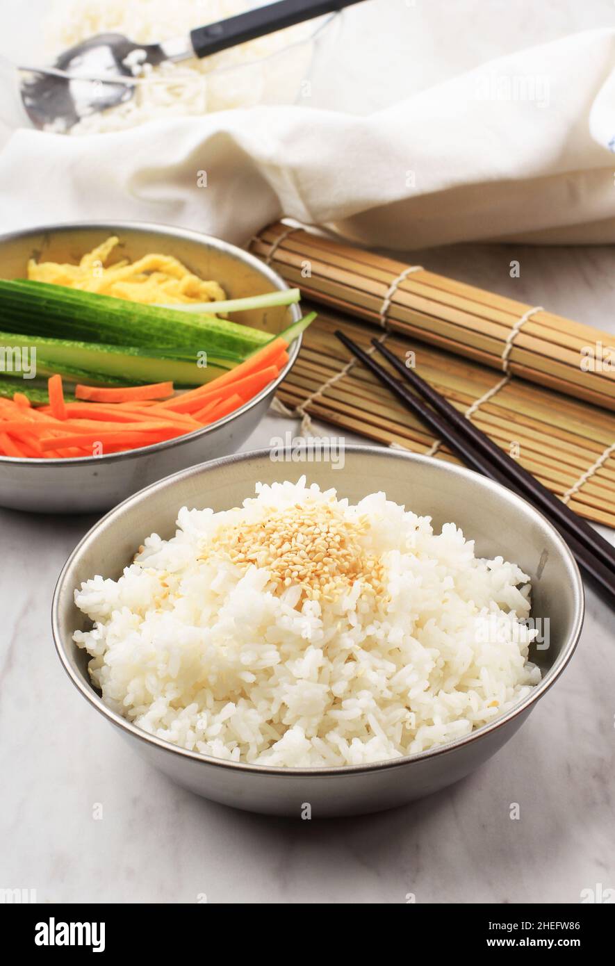 Korean Rice with White Sesame Seed on Top, Background Cucumber, Egg