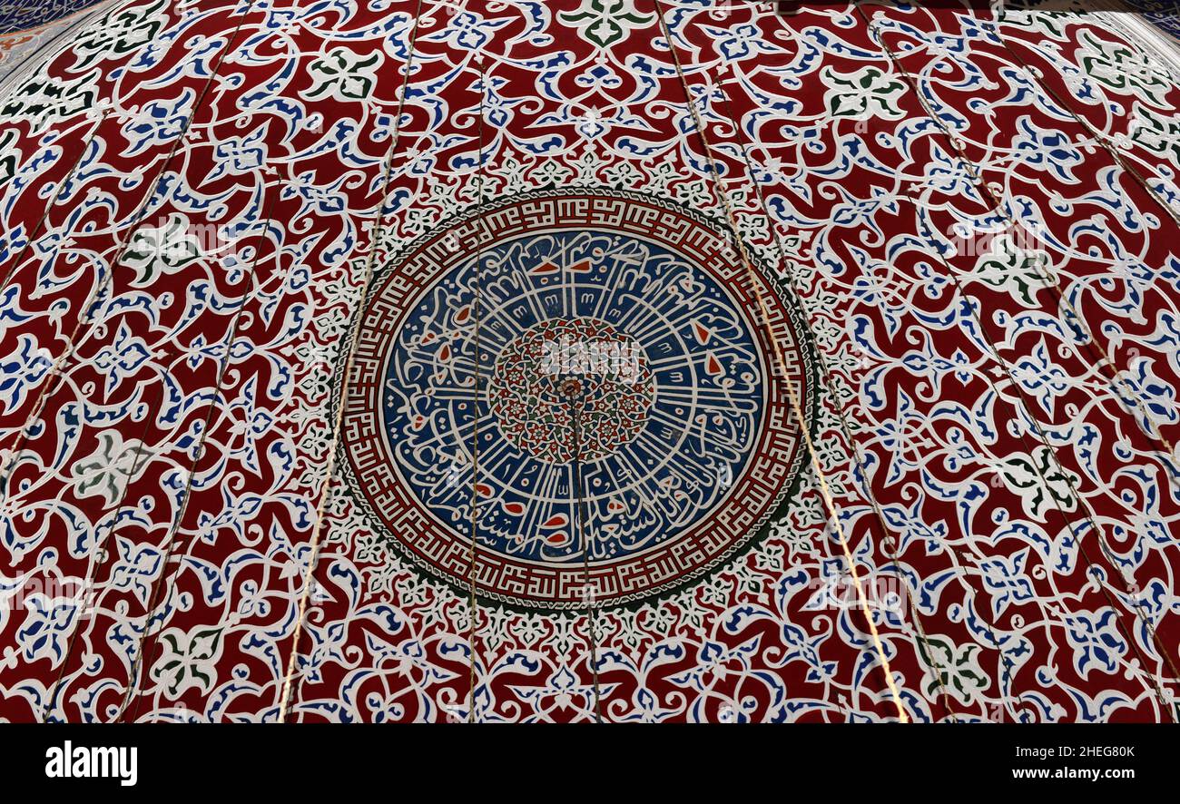 Ancient Ottoman patterned tile composition with some verses in Arabic from Holy Quran in Sultan Ahmet, Istanbul, Turkey. Stock Photo