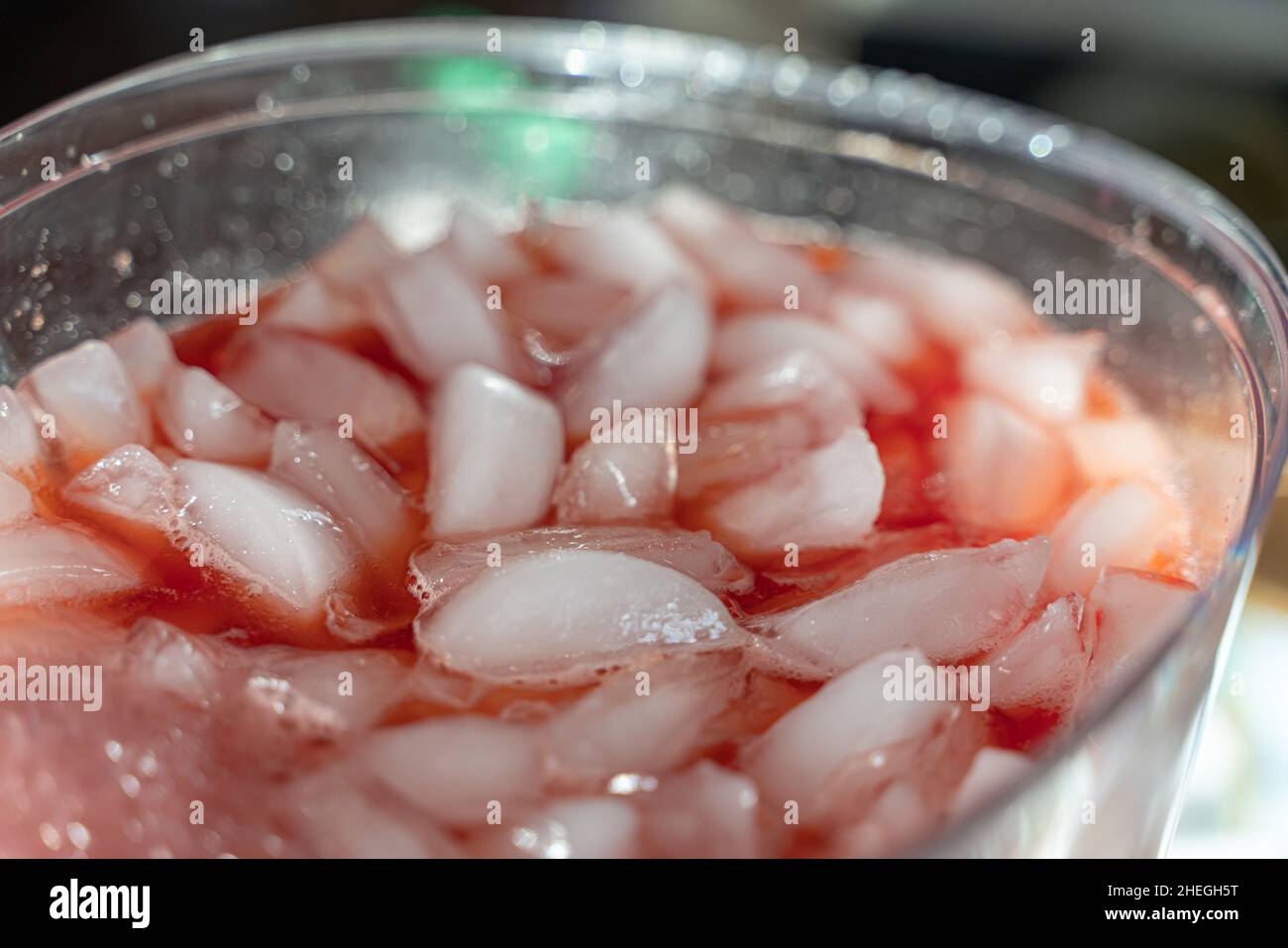 fruit punch in a drink dispenser at a party Stock Photo - Alamy