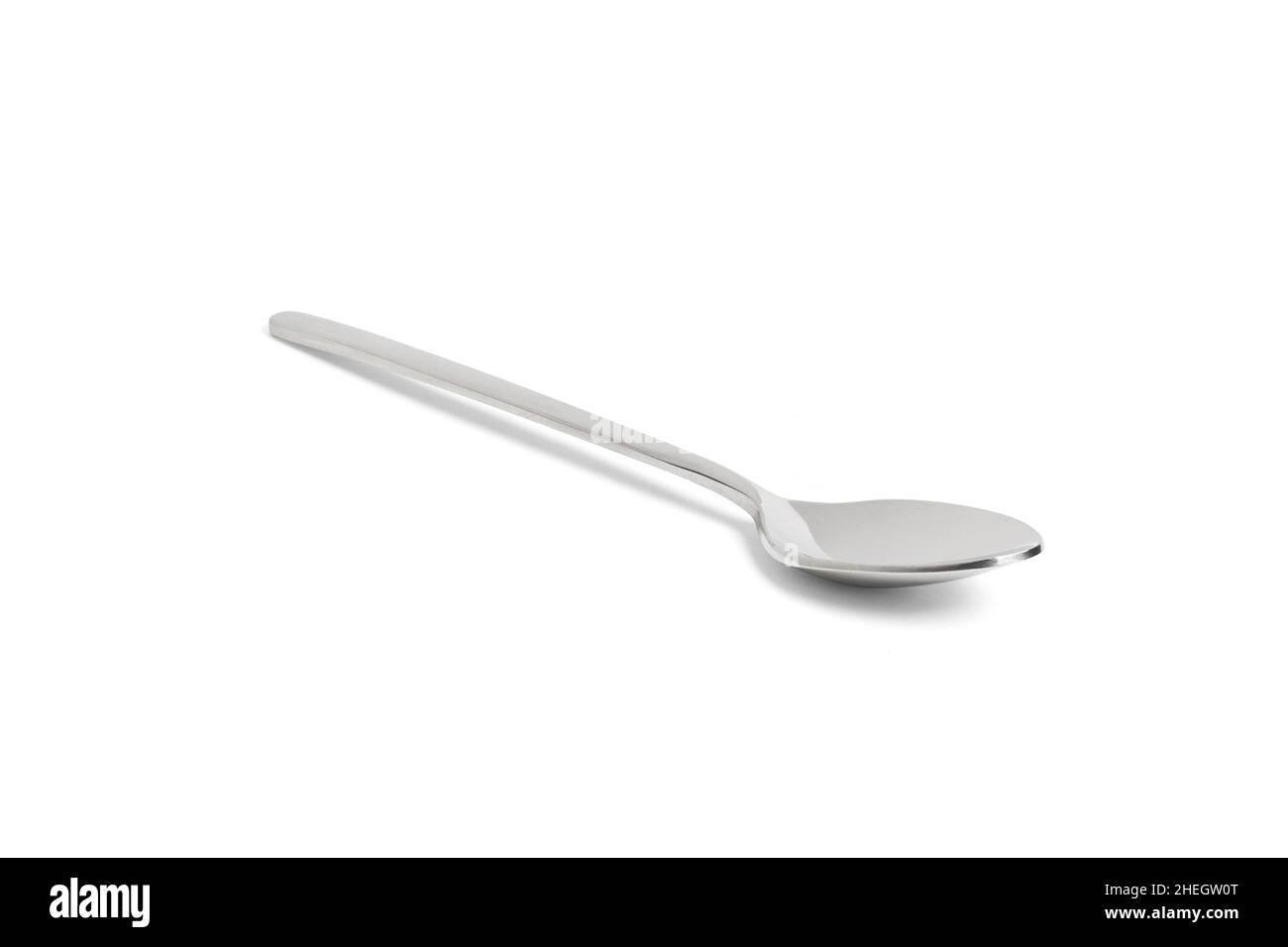 Clean shiny metal spoon isolated on white. Stainless steel small