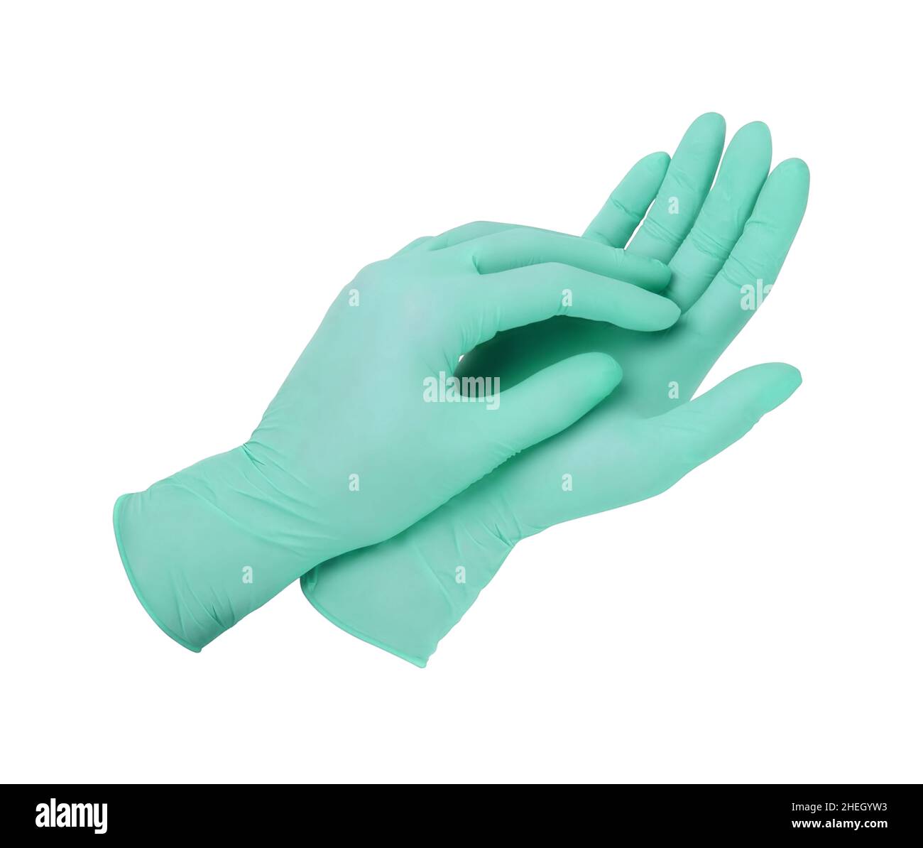 Medical gloves. Two green surgical gloves isolated on white background with hands. Rubber glove