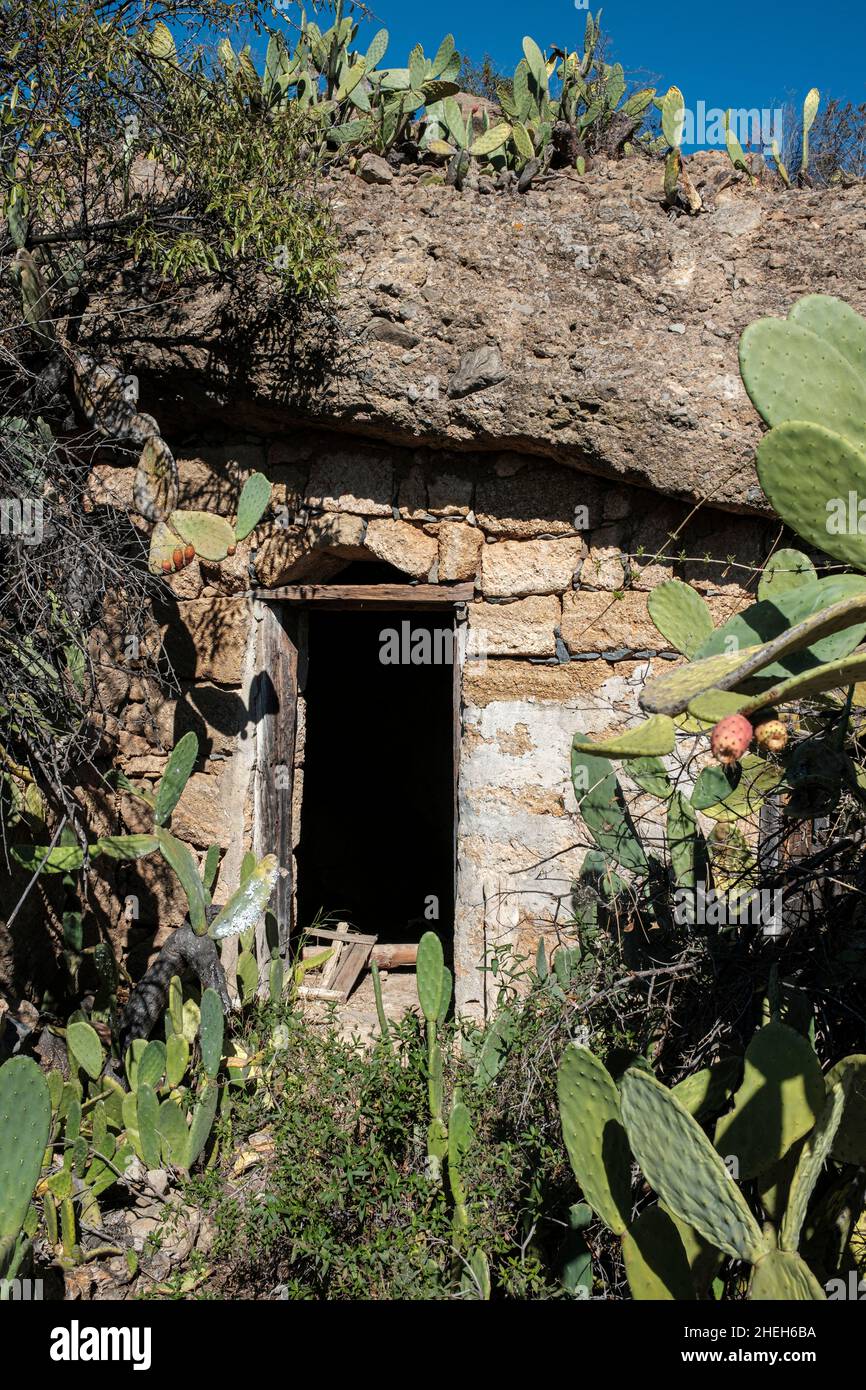 Open doorway to old disused cave dwellings near Las Vegas, Tenerife, Canary Islands, Spain Stock Photo