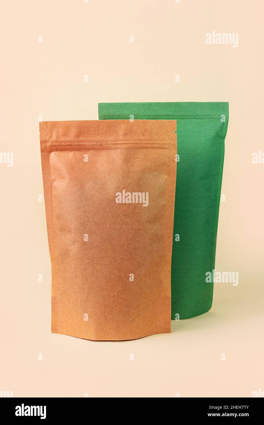 Pouch bags mockup assortment neutral beige background. Merchandise