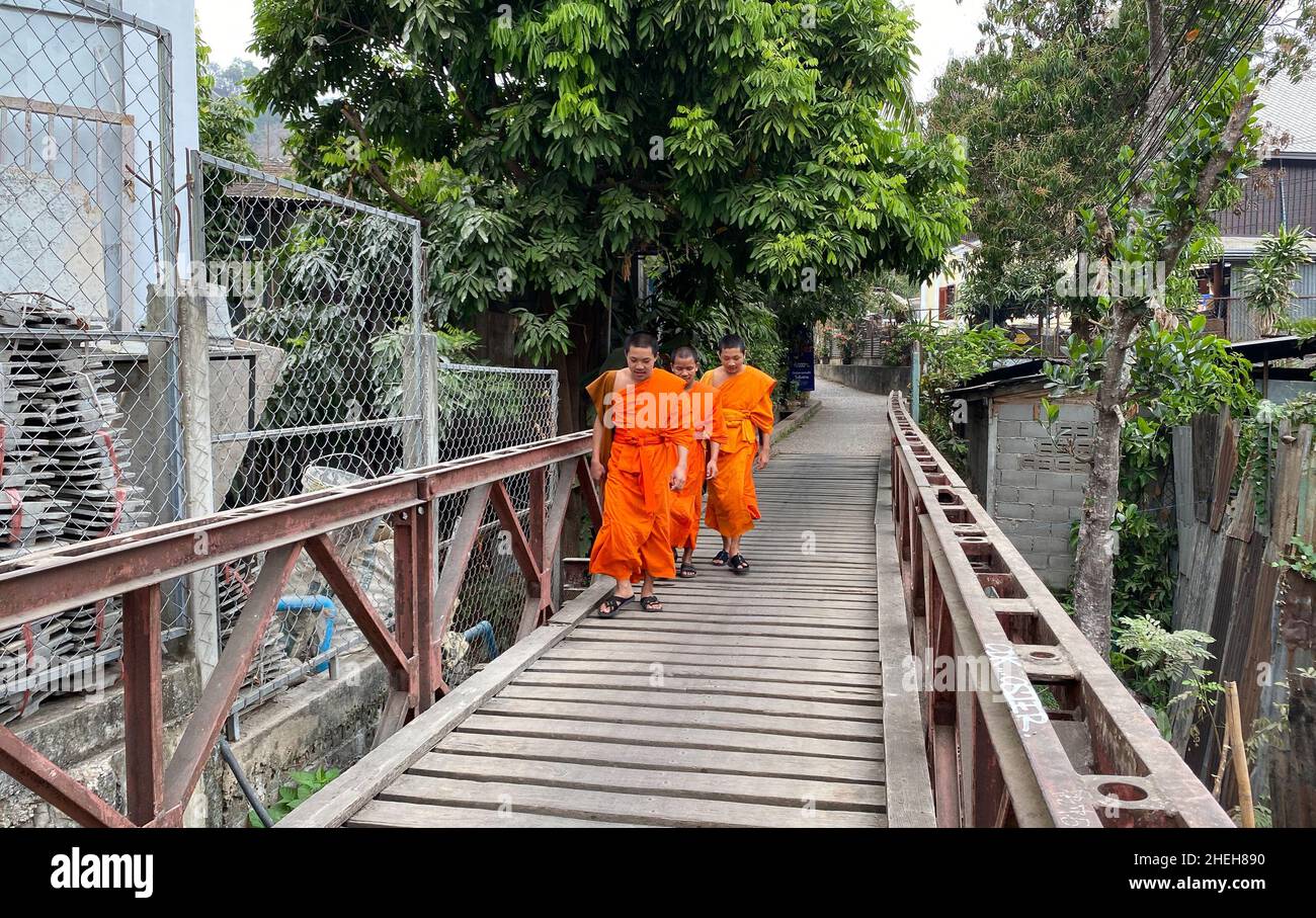 Luang Phrabang, Laos - Feb 5, 2020. Monks walking on street in Luang Phrabang, Laos. The city was the capital of the kingdom of Laos for thousands of Stock Photo