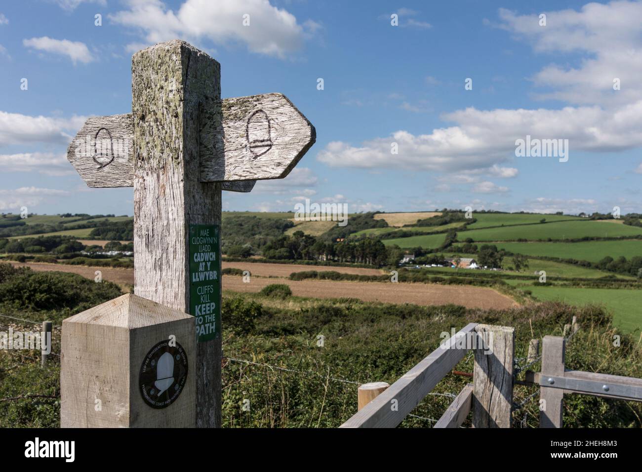 Welsh Signpost Pembrokeshire Coast Path National Path signpost, near Penally, Wales ...