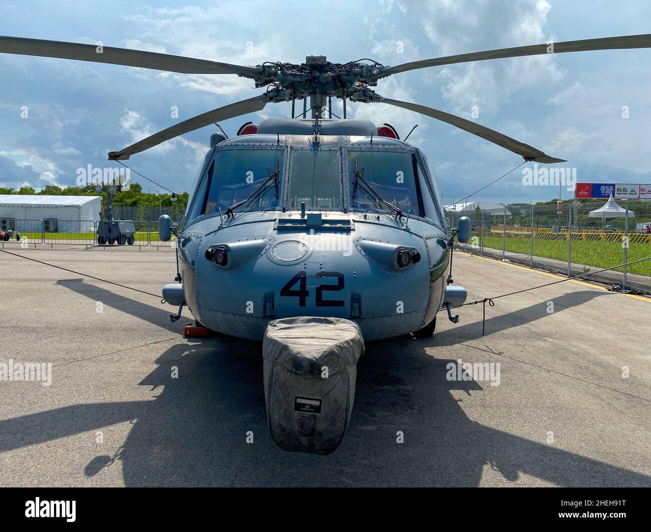 Singapore - Feb 12, 2020. Military airplane docking at Changi Airport in Singapore. Stock Photo