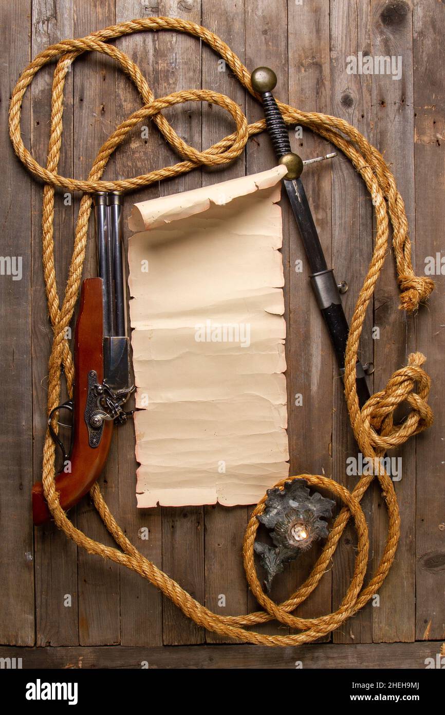 Pirate still life top view with blank scroll for card or text and beautiful rope frame Stock Photo