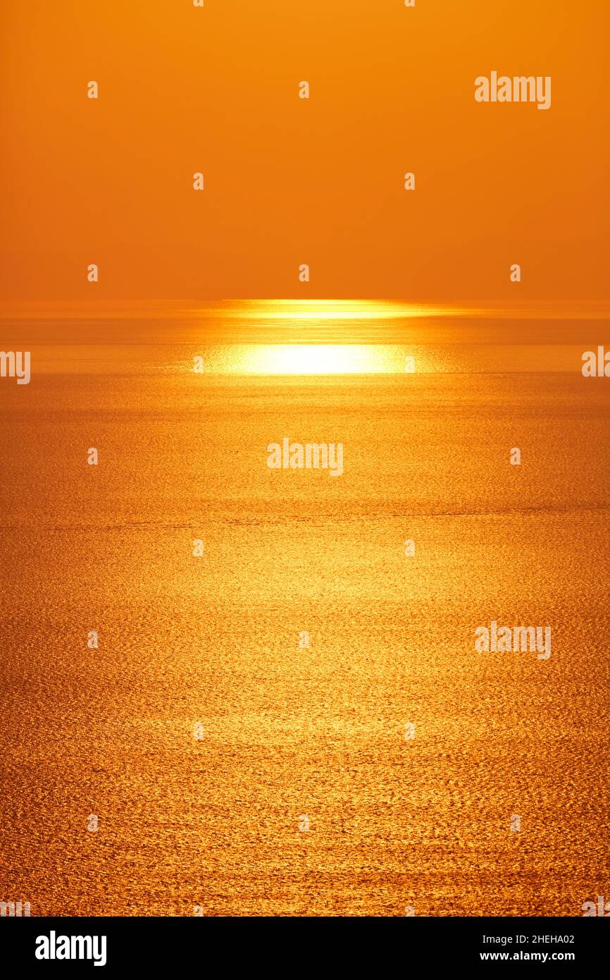 Golden sunset above the sea Stock Photo - Alamy
