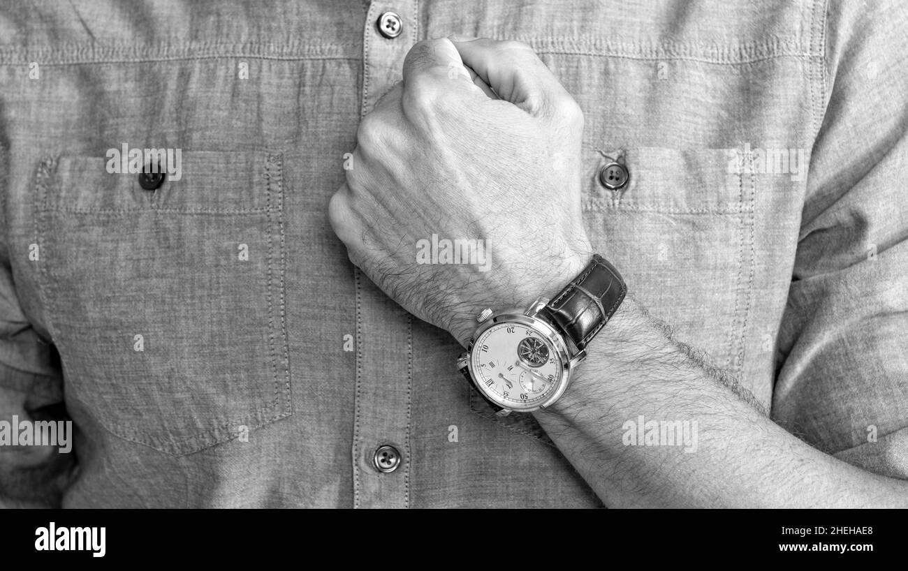showing wristwatch. you are late. deadline. time management. mens wardrobe. Stock Photo