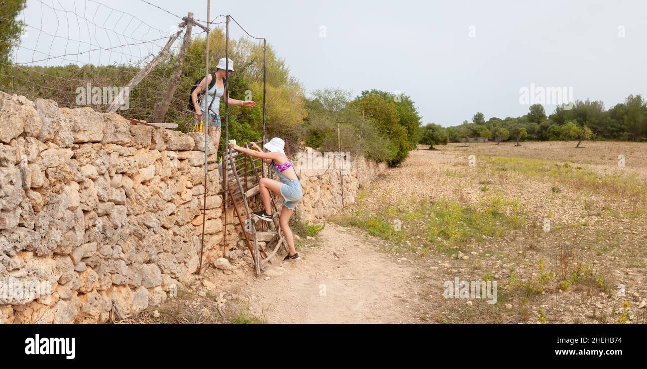 Family walking in the countryside, Mallorca, Spain Stock Photo
