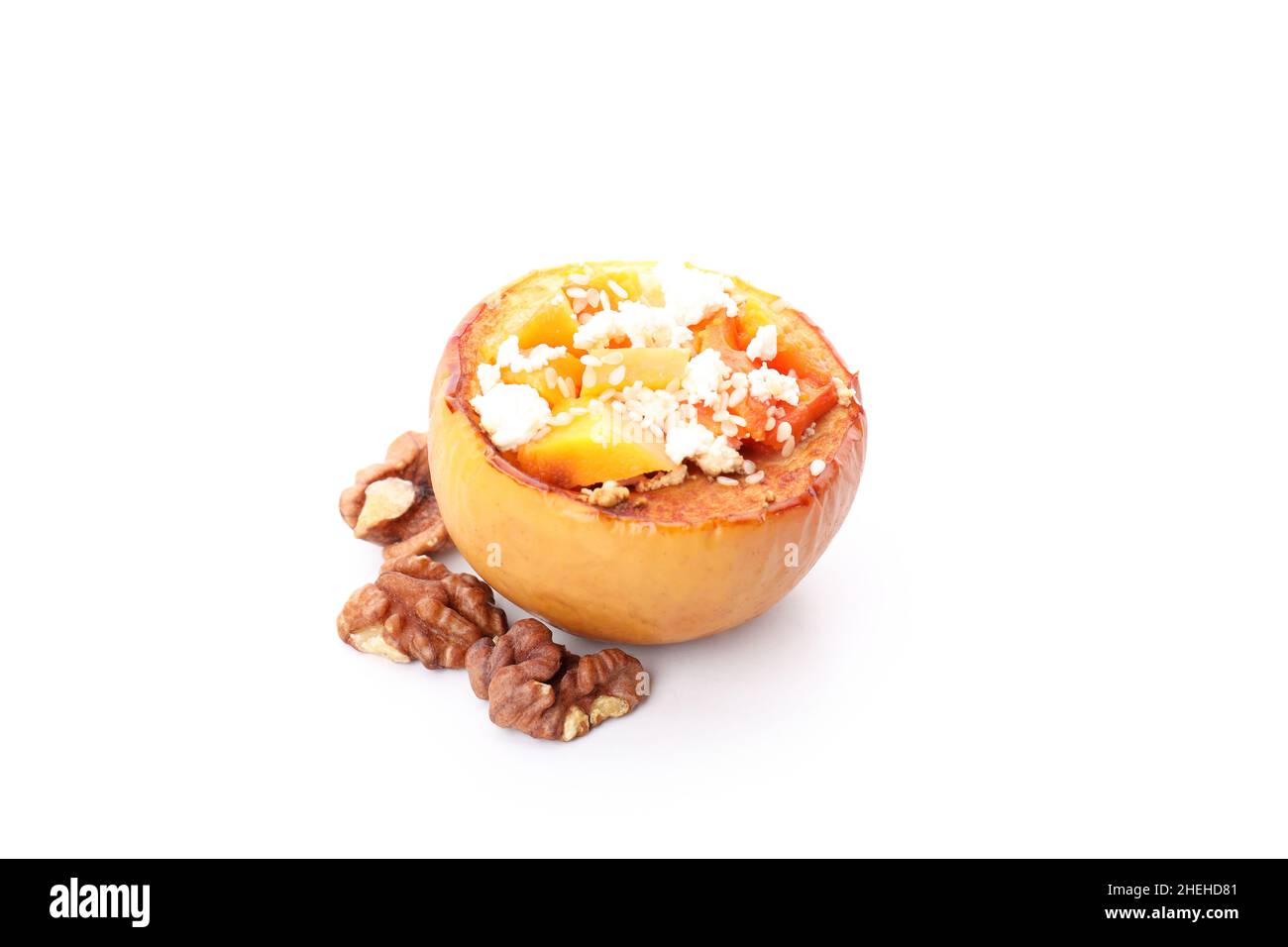 Stuffed baked apple isolated on white background Stock Photo