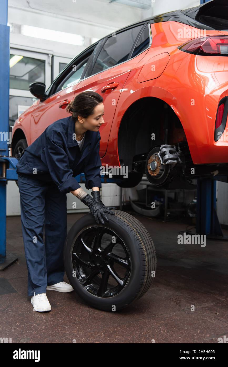 Woman auto tire mechanic in hi-res stock photography and images - Alamy