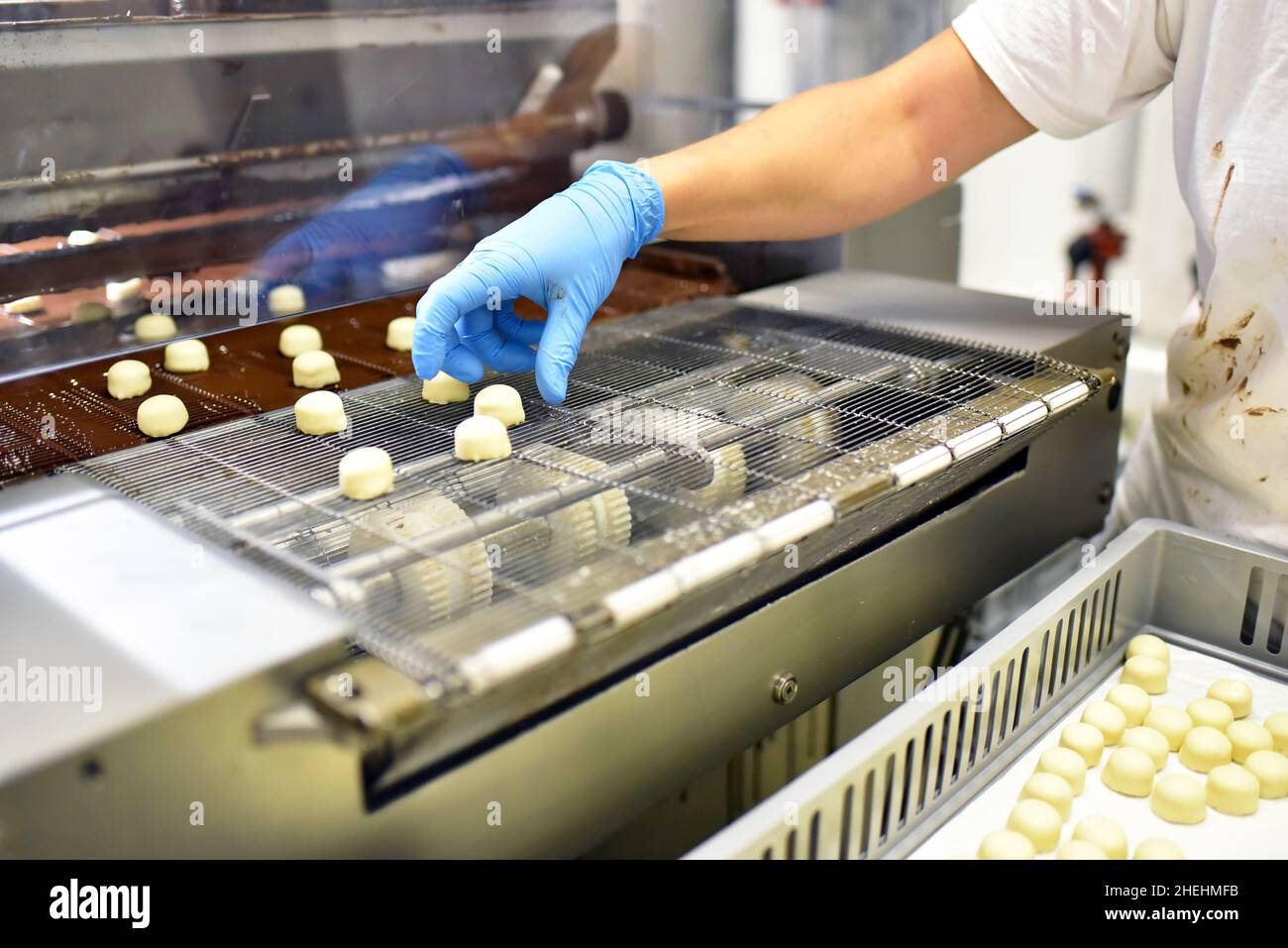 Production of pralines in a factory for the food industry Stock Photo