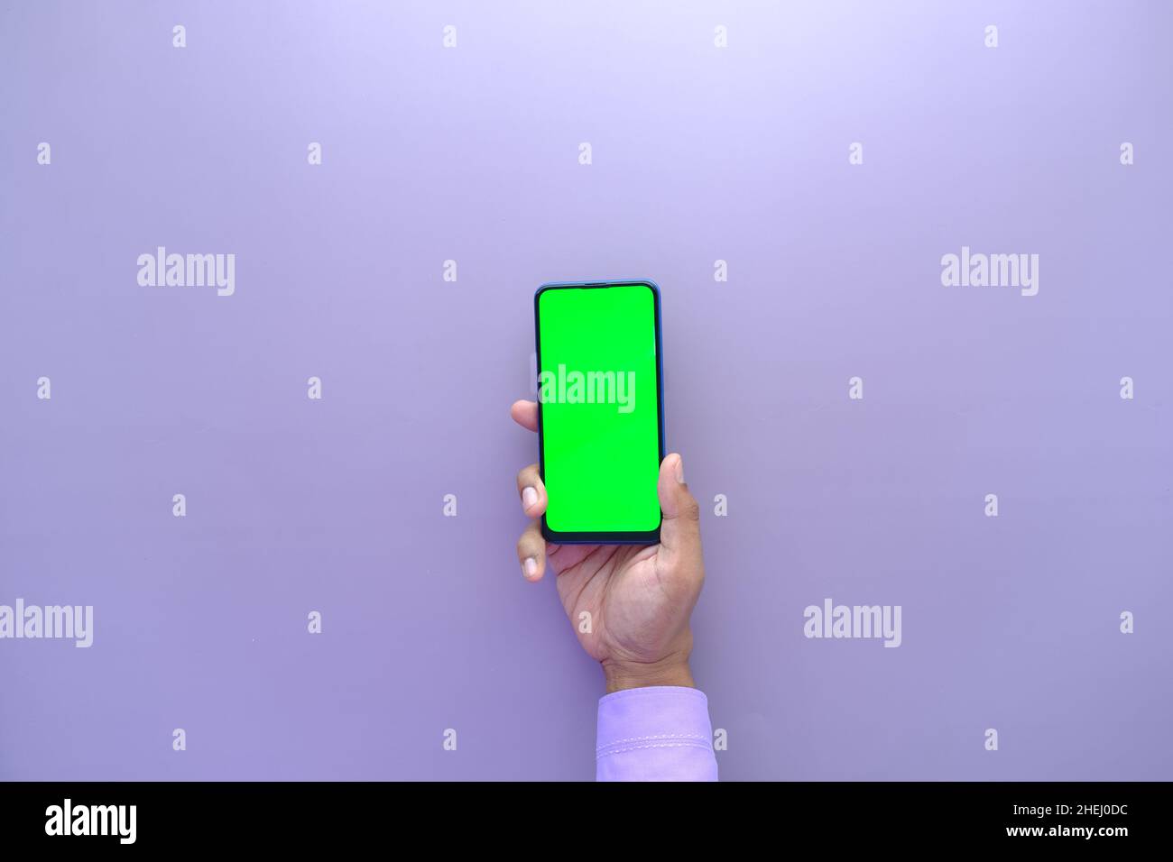top view of young man hand using smart phone with green screen Stock ...