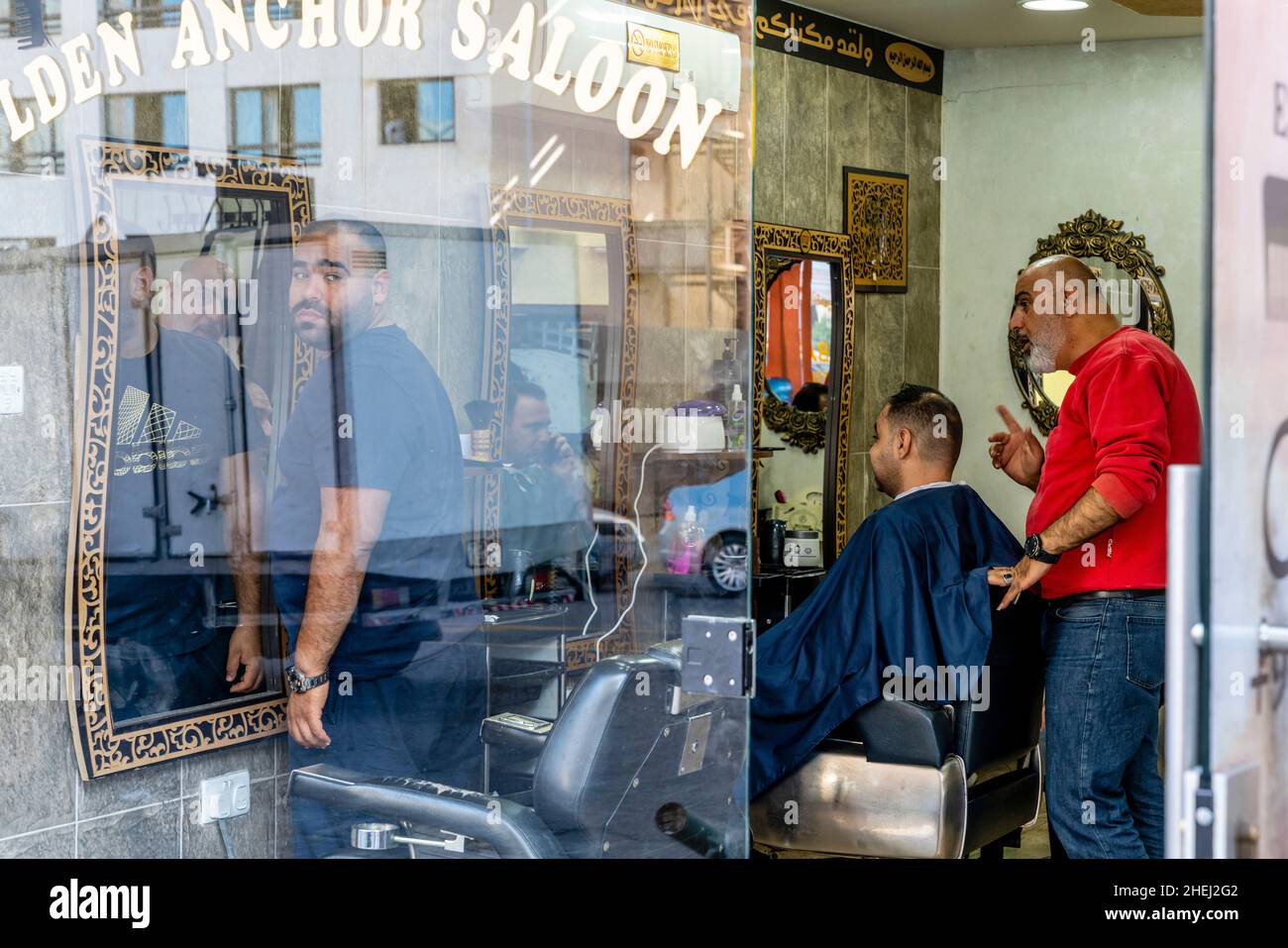 A Mens Hairdressing Salon In Aqaba, Aqaba Governorate, Jordan. Stock Photo