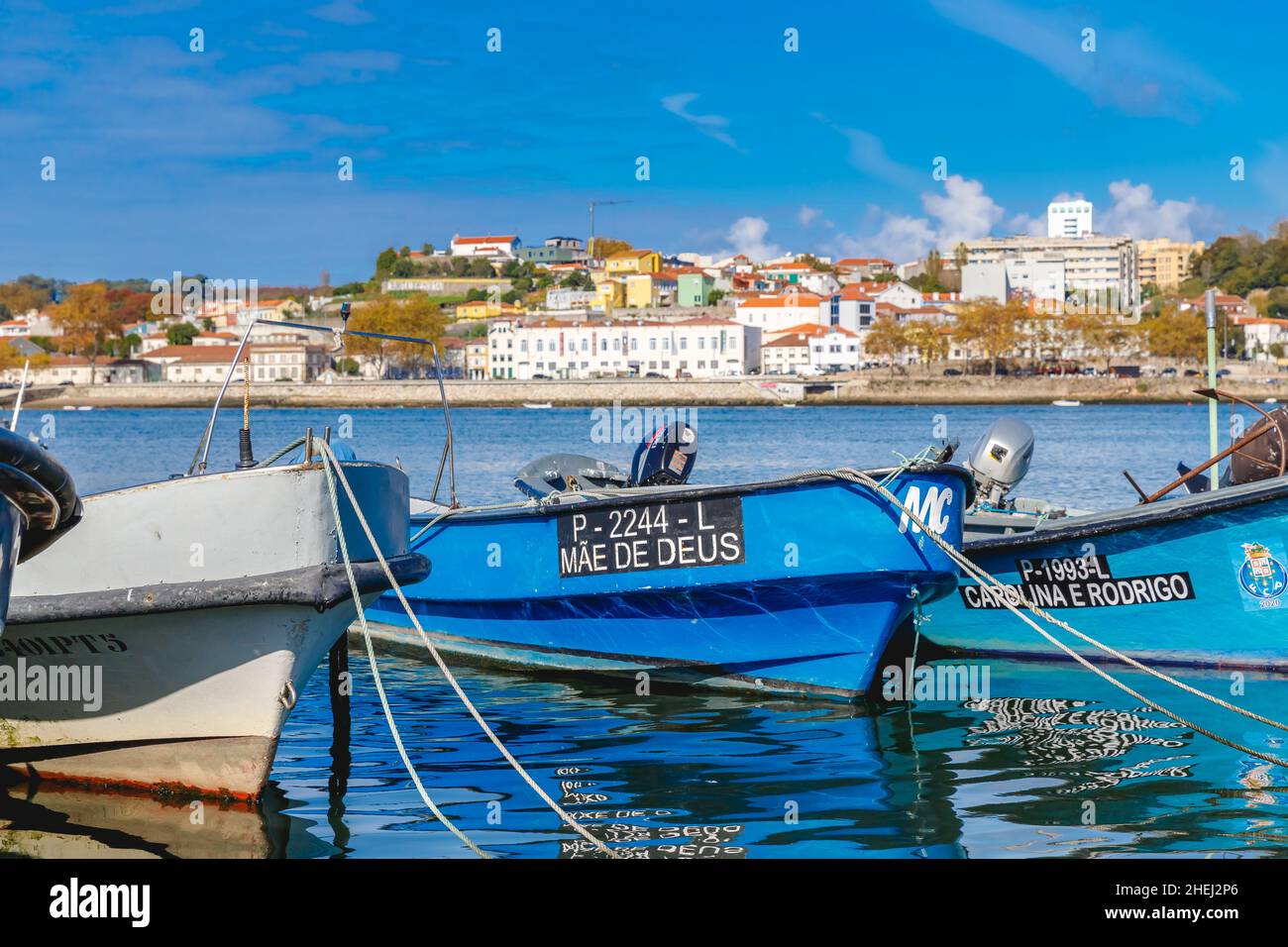 Porto, Portugal - October 23, 2020: Small fishing boats in the fishing port  of Afurada at the exit of the mouth of the Douro river on an autumn day  Stock Photo - Alamy