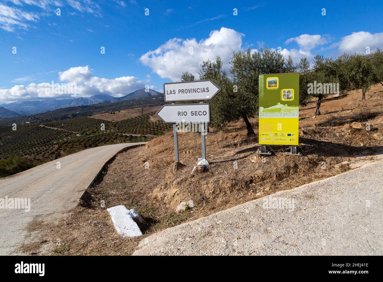 Road signs to Rio Seco and Las Provincias in olive trees near Zalia, Alcaucin, La Axarquía, Andalusia, Spain Stock Photo