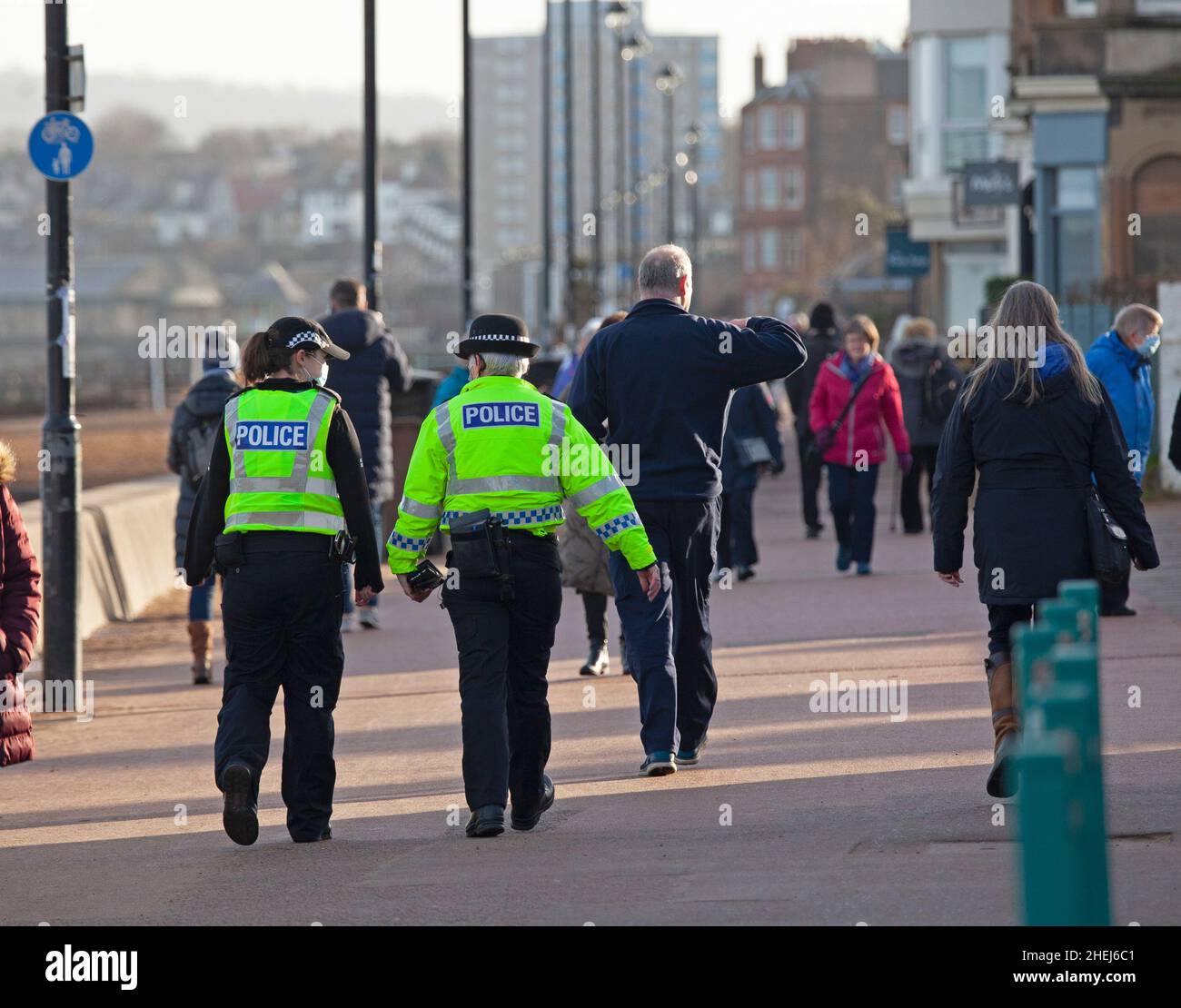 Portobello, Edinburgh, Scotland, UK. 11th Jan, 2022. Police presence on promenade the female officers had been asking members of the public for any detailed information regarding missing Alathea (Alice) Byrne if they were at the beach on the morning of 1st January 2022 when the young woman was last seen, taking thorough notes from anyone who was. Officers are also conducting house to house enquiries in the Portobello area. Credit: Archwhite/Alamy Live News Stock Photo