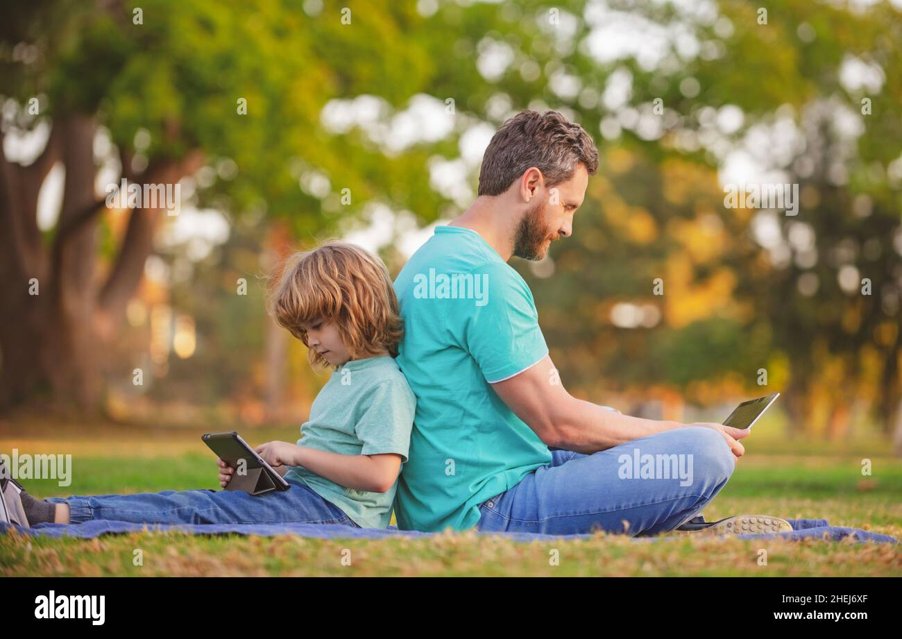 kid-with-daddy-learning-lesson-father-and-son-use-laptop-dad-and